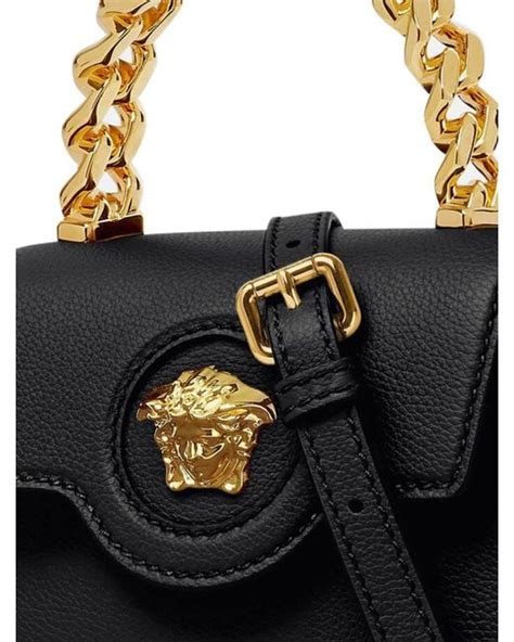 versace black tote bag|More.